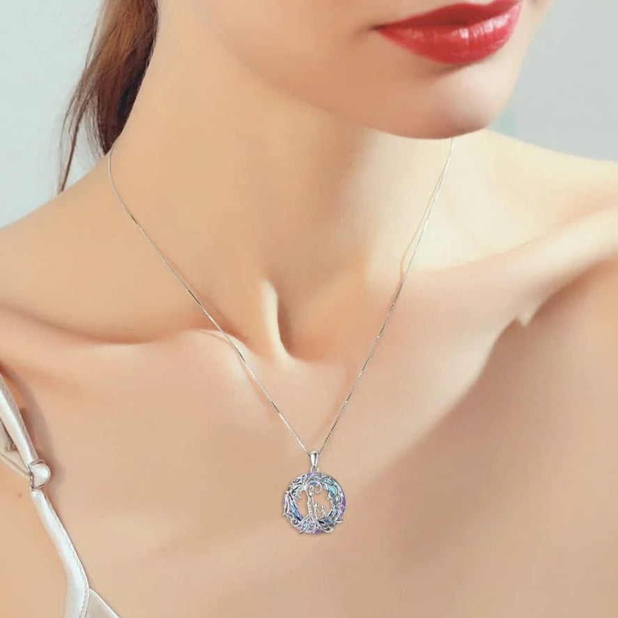 Woman wearing Tree of Life family pendant, thoughtful gift for mom