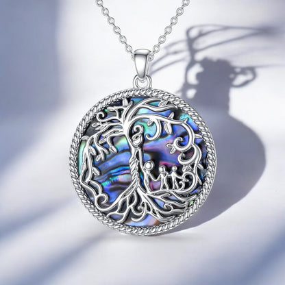 Tree of life pendant on chain with soft light background